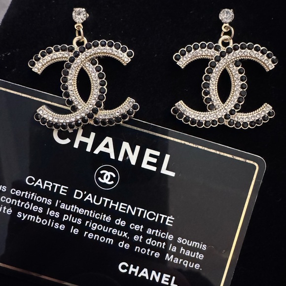 CHANEL Jewelry - CHANEL Black and Gold Crystal Logo Earrings